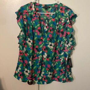 Floral V neck top with ruffle sleeves
